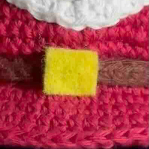 felt belt buckle attached to belt