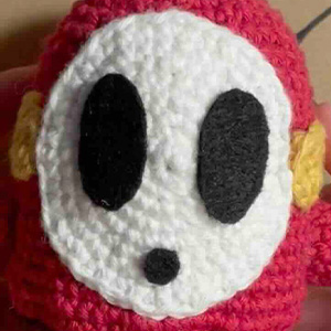 felt face attached to mask